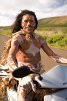 Indigenous Rapa Nui man on scooter, Easter Island, Chile