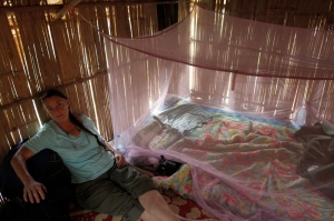 Gail in bamboo hut in hill tribe village, northern Thailand