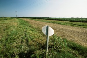 Bent stop sign at crossroads, Mississippi Delta